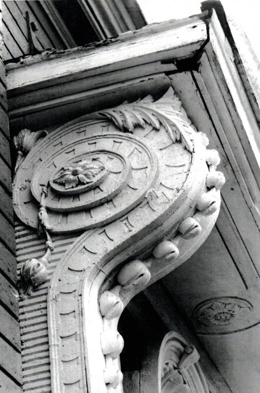 Bracket over the niche decorated with "lilies"