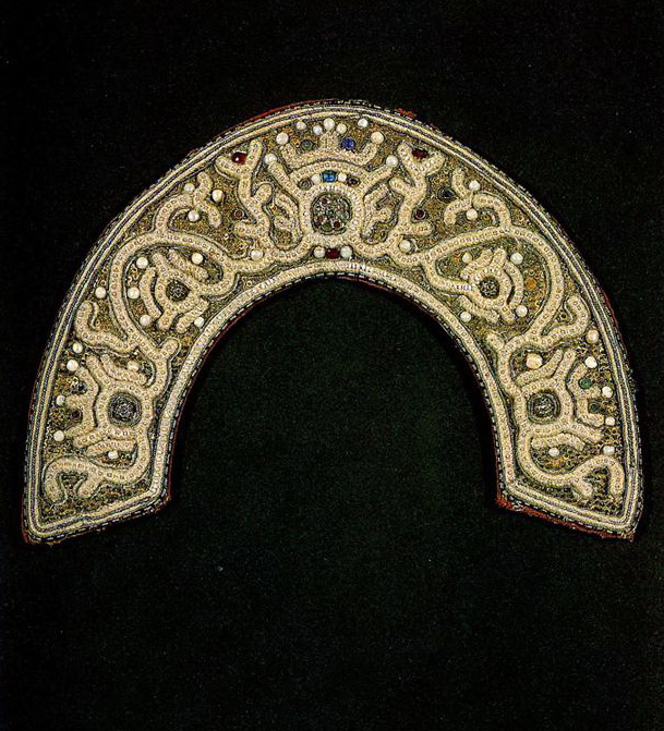 Olonetz headdress with stylized half-figures of women and plant motifs