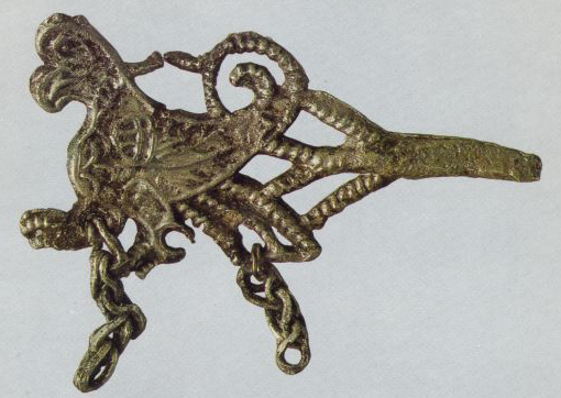 Pin with a head in the form of a winged bird.