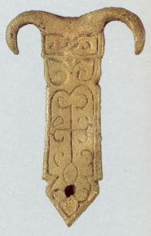 Belt tip . 12th century