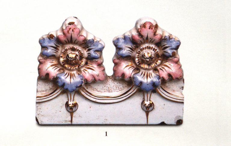 Tiles with painted relief ornament and gilding. <br/>Early 20th century
