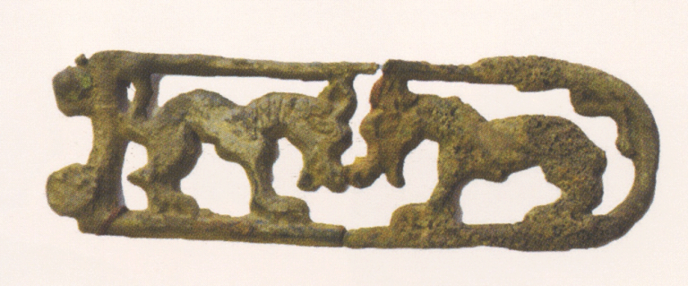 Bronze tip of the knife with the image of a bird of prey. <br/>1st century AD