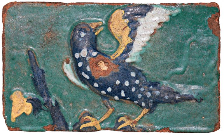 Tile with a bird image