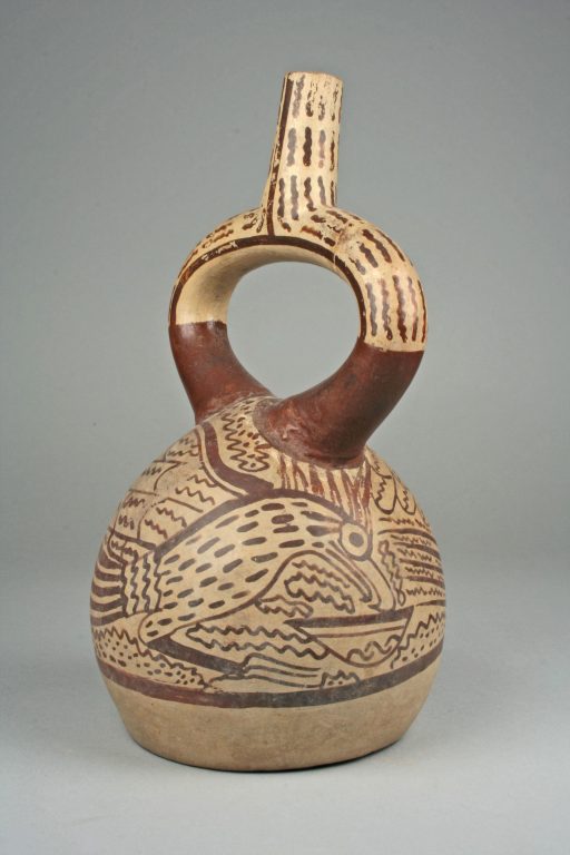 Stirrup spout bottle with hawk