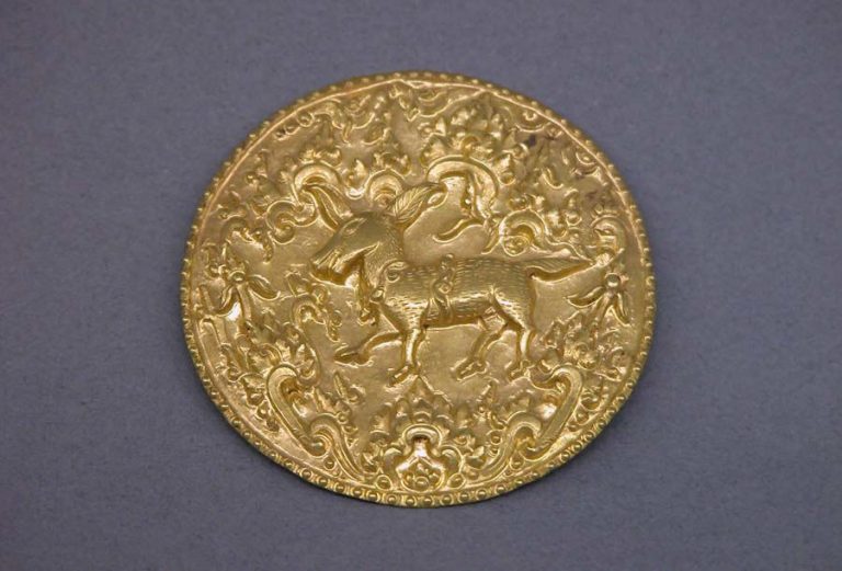 Disk or Subang Cover with Deer Surrounded by Foliate